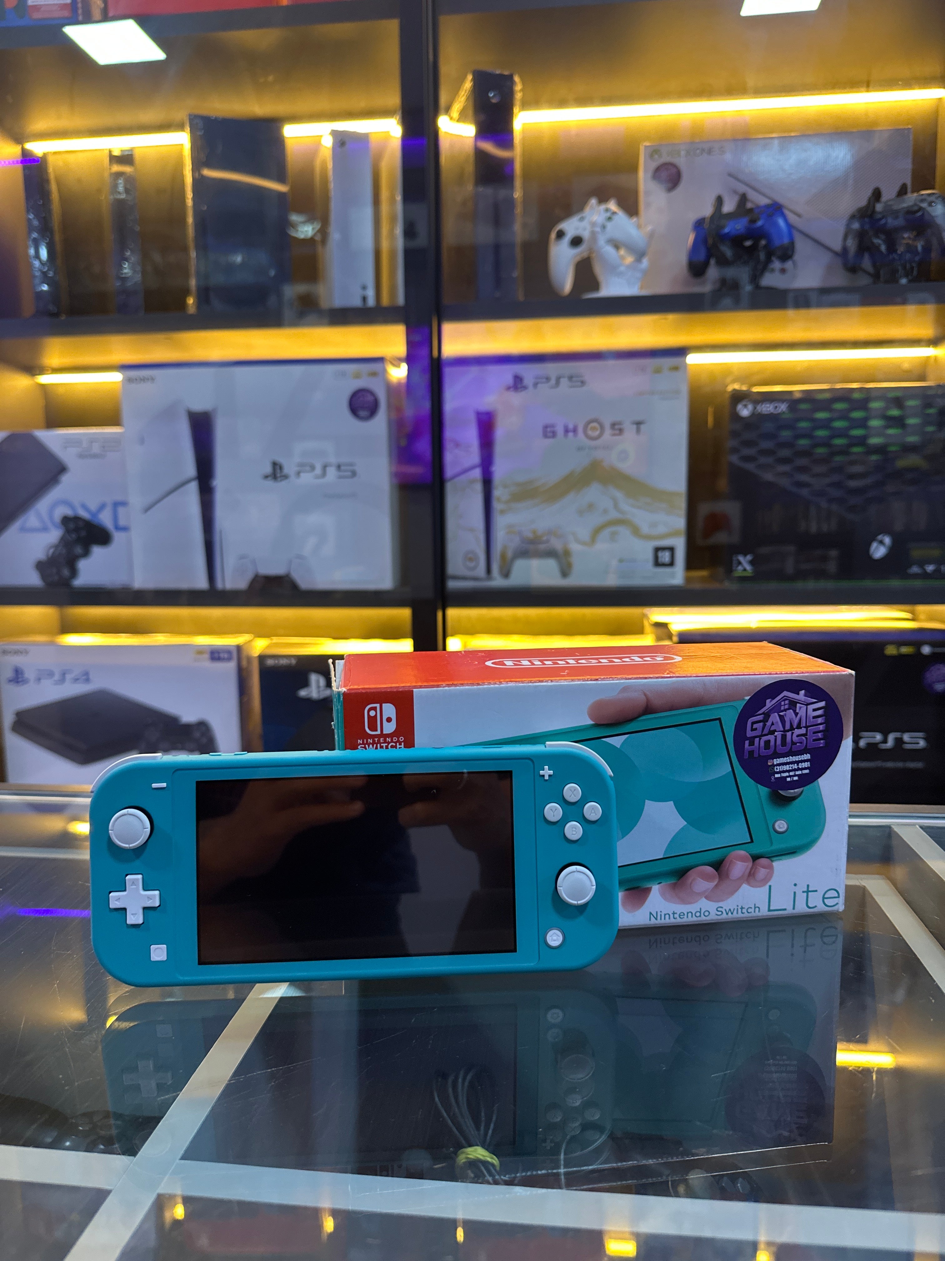 Nintendo switch lite Desbloqueado 128gb +40 jogos Semi novo ( foto demonstrativa)
