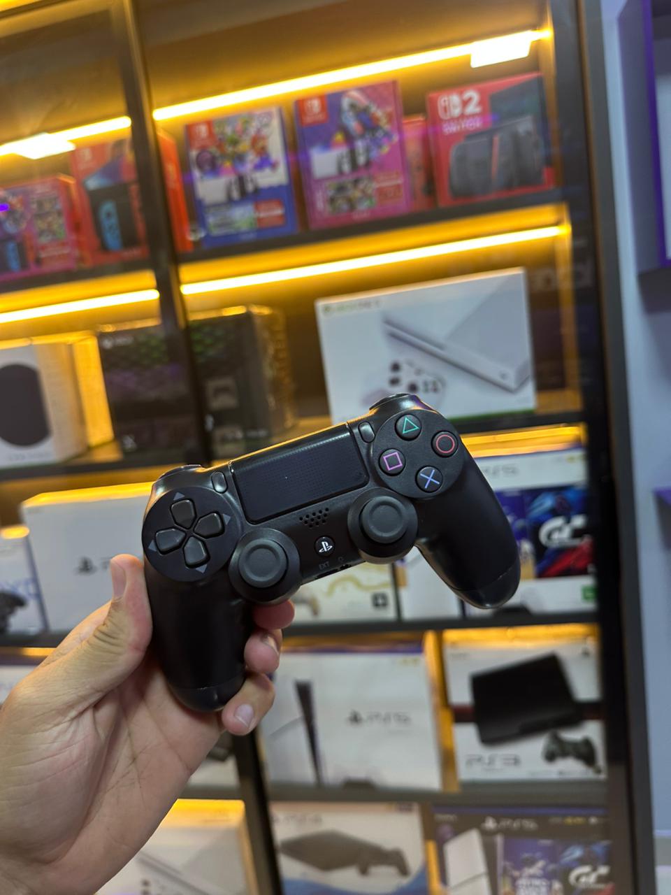 Playstation 4 slim 1tb semi novo + 2 controles + 1 jogo variavel * foto ilustrativa*