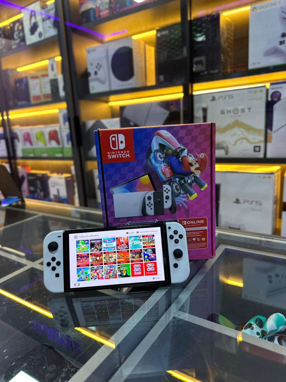 Nintendo switch oled semi novo desbloqueado 128gb + 40 jogos * fotos ilustrativa*